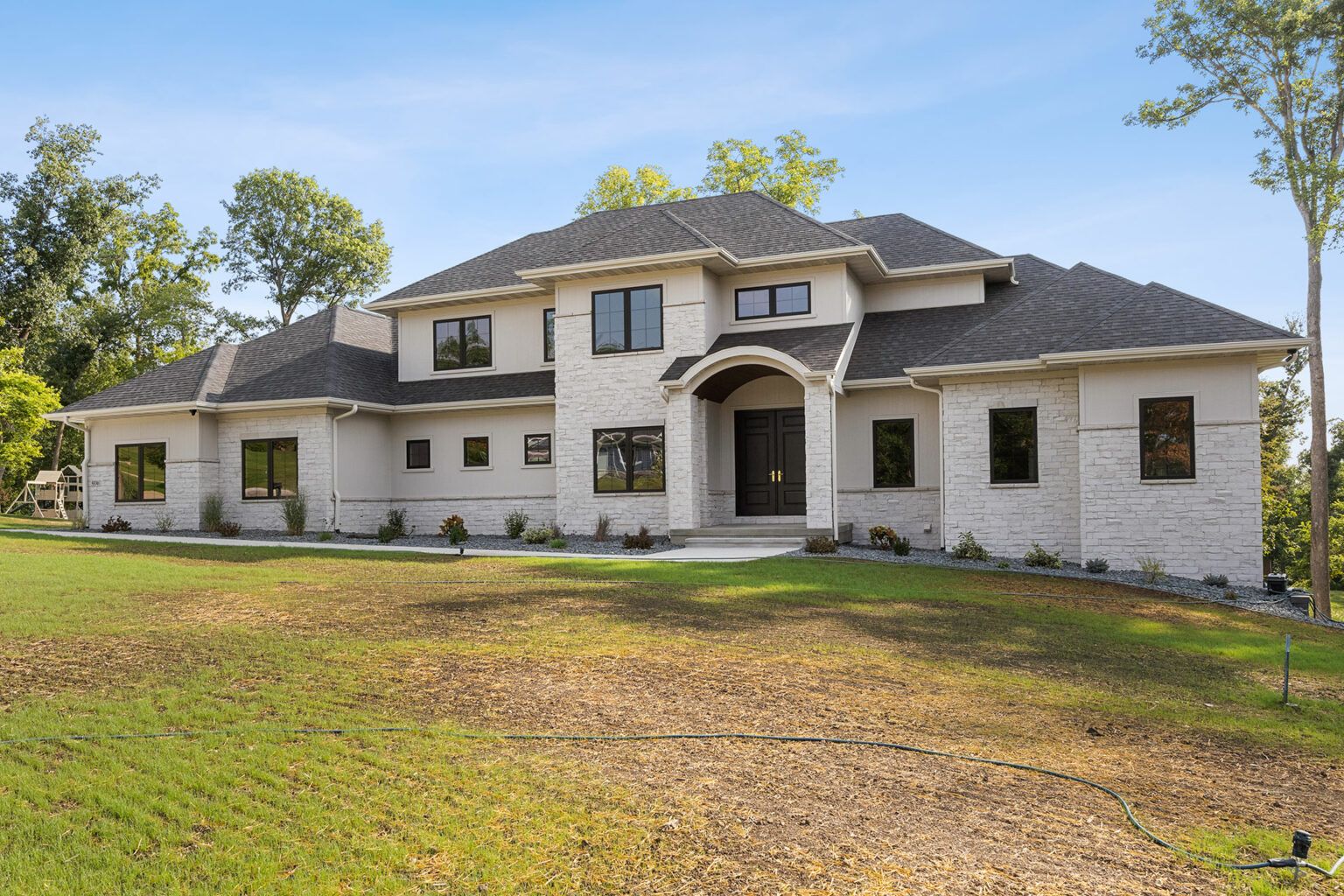casa en Precision Builders por Precision Builders