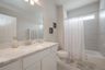 casa en Sunterra por Colina Homes