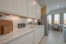 casa en Sunterra por Colina Homes