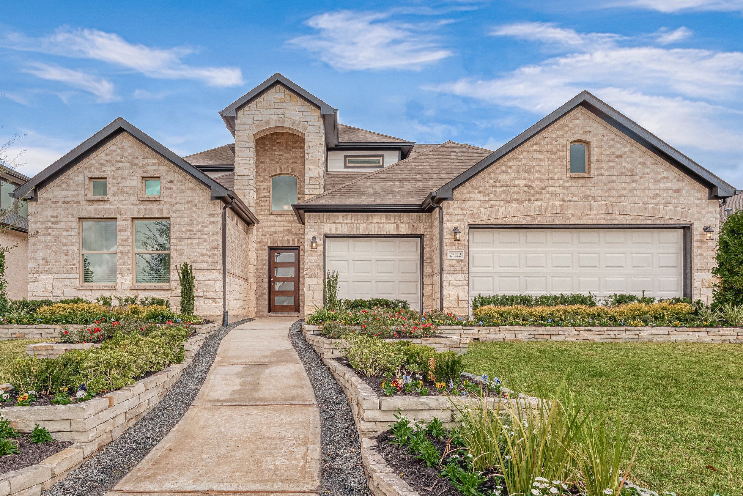 casa en Sunterra por Colina Homes