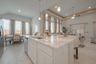 casa en Sunterra por Colina Homes