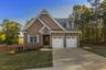 casa en Circle H Builders por Circle H Builders