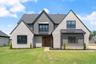 casa en Pintail Construction por Pintail Construction