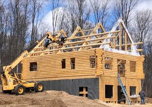 Wolverine Log Homes por Wolverine Log Homes en Traverse Michigan