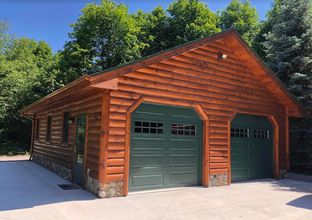 Wolverine Log Homes por Wolverine Log Homes en Traverse Michigan