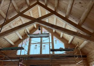 Wolverine Log Homes por Wolverine Log Homes en Traverse Michigan