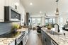 casa en Mira Lagos Townhomes por Grenadier Homes