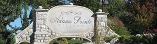 Adams Pointe Village por Elevate Design + Build en Kansas City Missouri