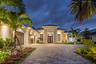 casa en Wild Orchid At Olde Cypress por Distinctive Communities