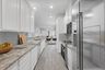 casa en Woodland Lakes por Colina Homes