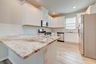 casa en Sunterra por Colina Homes