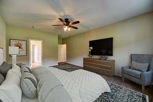 Main Floor Primary Suite - Red Door Homes: Florence, South Carolina - Red Door Homes