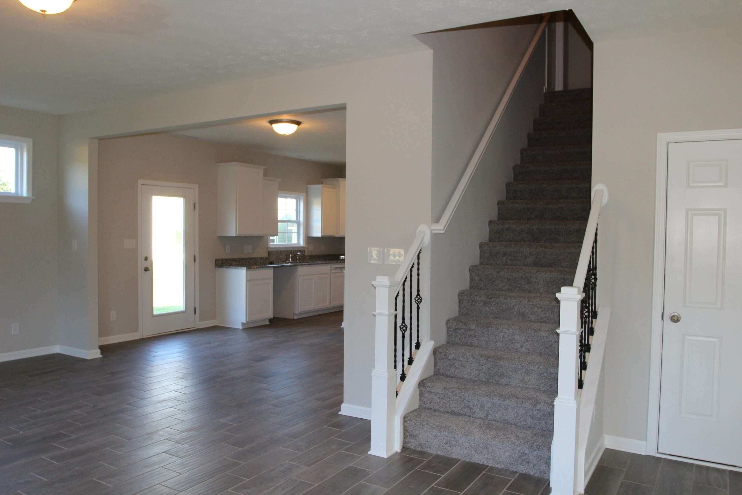 casa en Windstar Woods por Beacon Builders