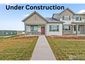 casa en Centennial Crossing At Milliken por Windmill Homes