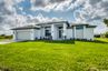 casa en Ramos Builders, Inc. por Ramos Builders, Inc.
