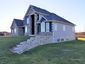 casa en Cobblestone Builders por Cobblestone Builders
