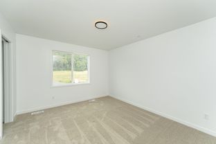 The Village Townhomes por R Fleming Construction en Rochester Minnesota