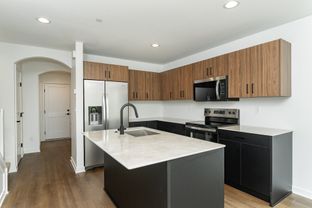 The Village Townhomes por R Fleming Construction en Rochester Minnesota