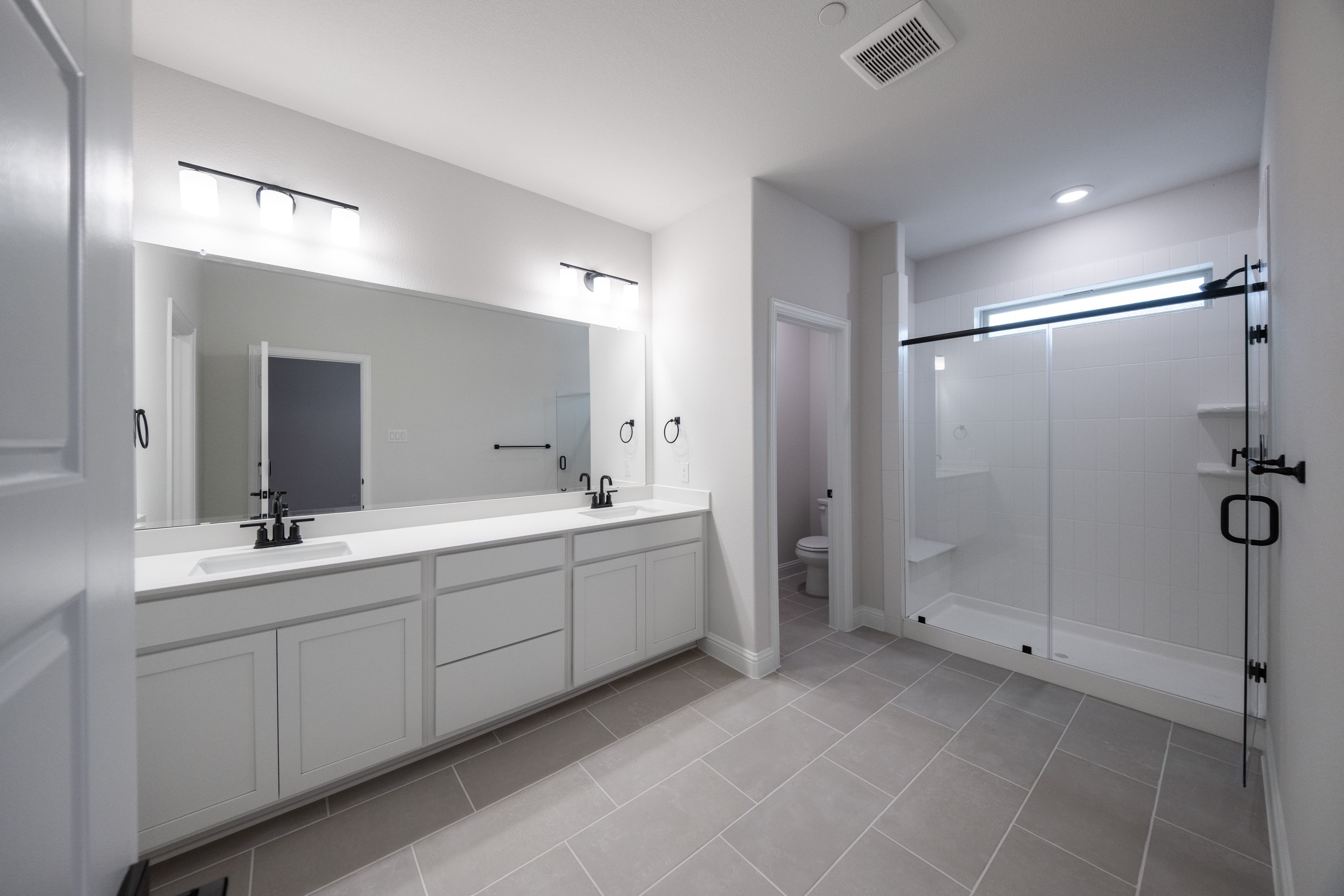 open primary bathroom with walk-in shower