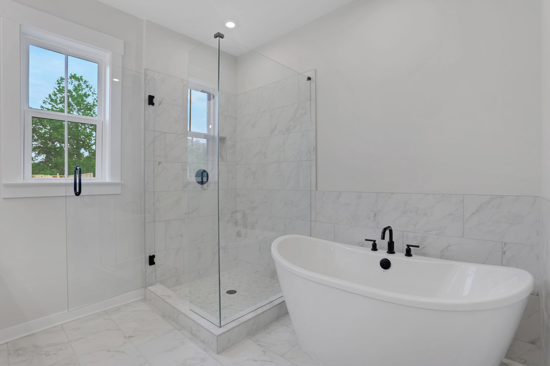 primary bathroom with soaker tub and walk-in shower