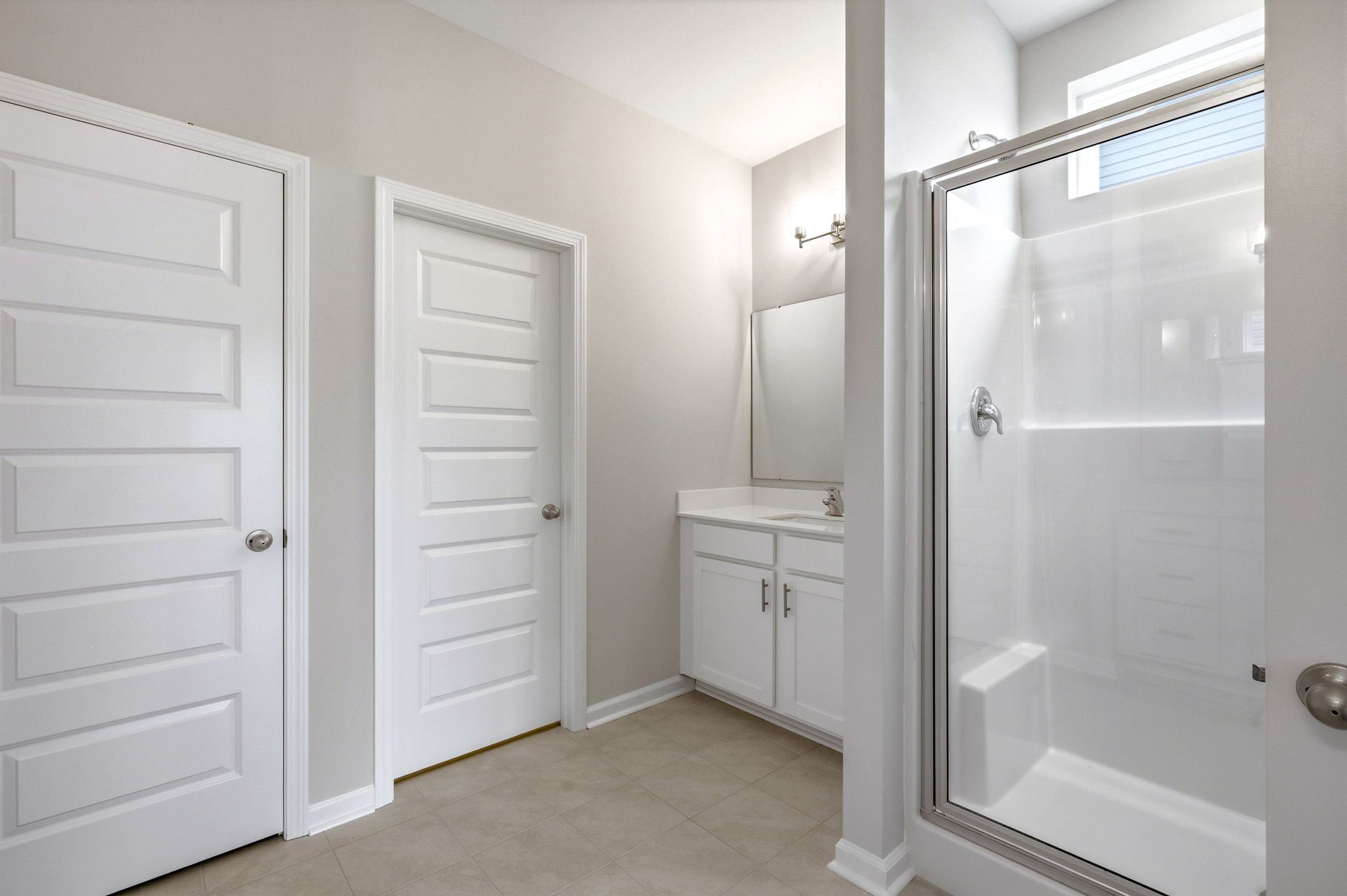 Primary Bathroom Shower and Vanity 2