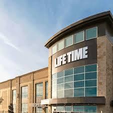 A luxury fitness center offering a variety of amenities and various membership options. 