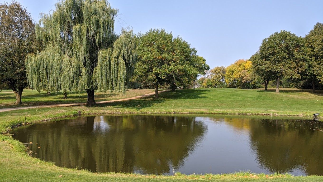 Public course and country club featuring a golf track with well-maintained greens, and a restaurant.