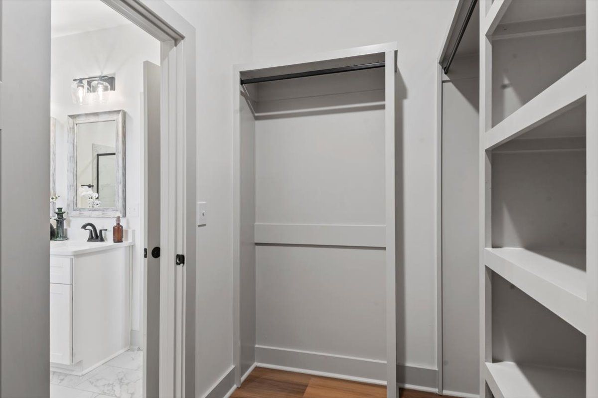 Elmwood Master Closet with Wood Shelving