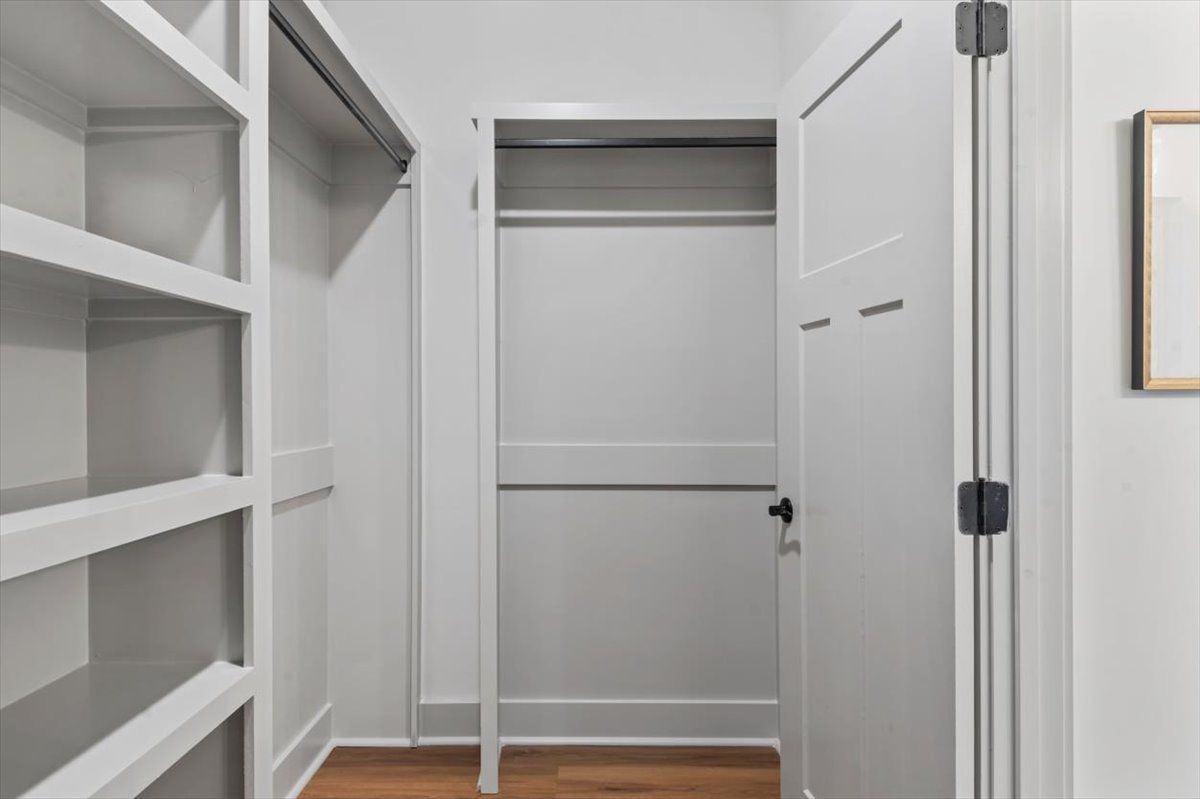 Master closet with built-n shelving, 3 panel interior doors
