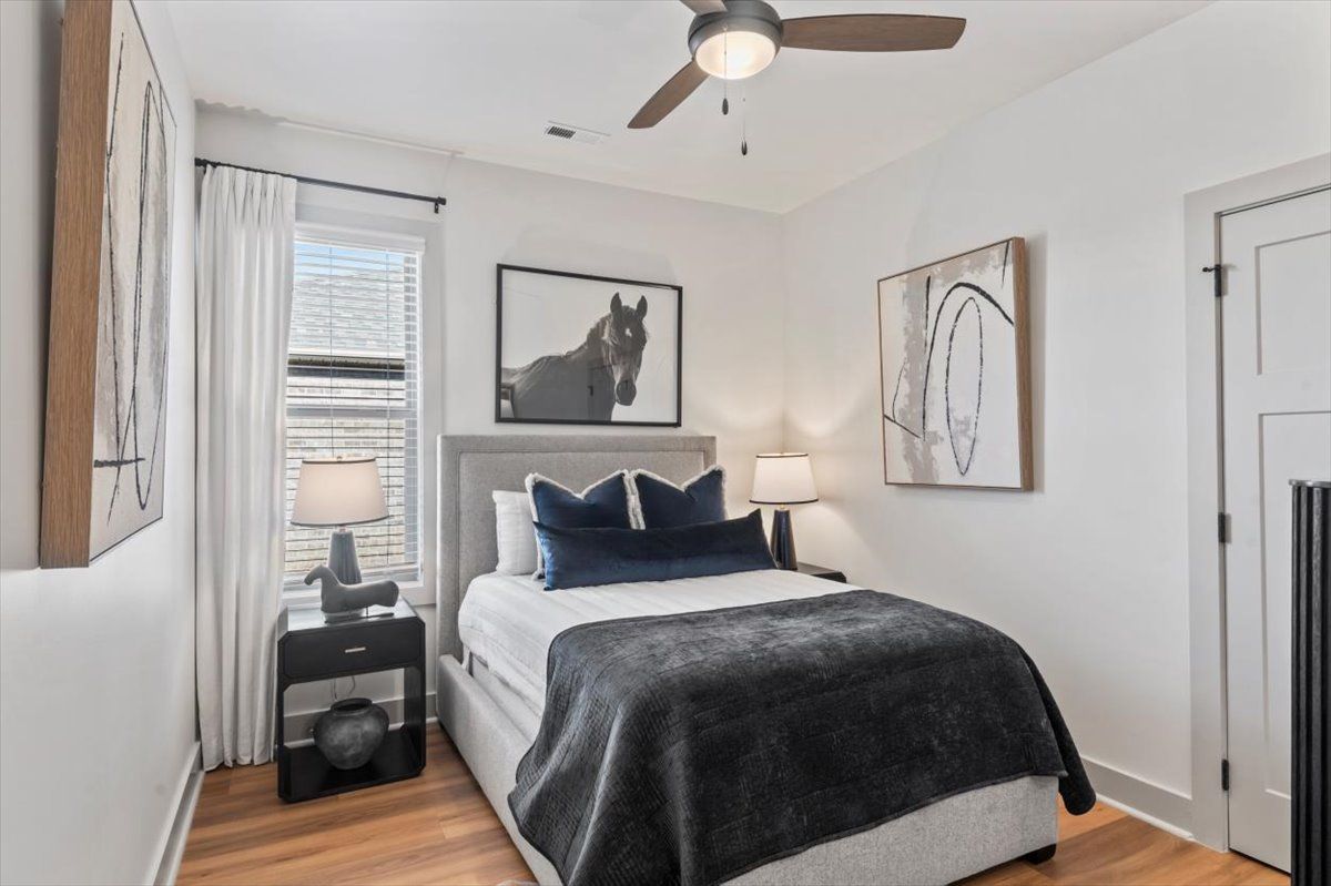 Third Bedroom with ceiling fan and natural light