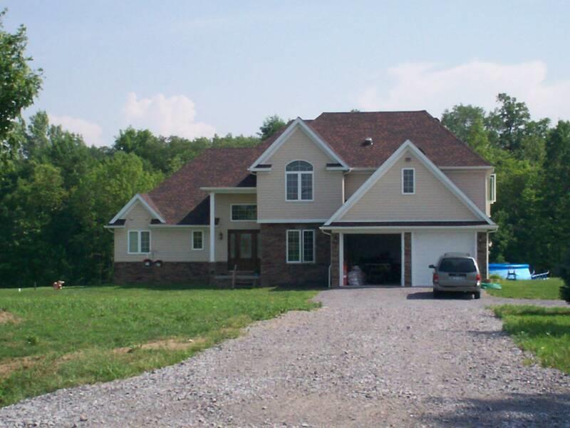 casa en Breton Construction por Breton Construction