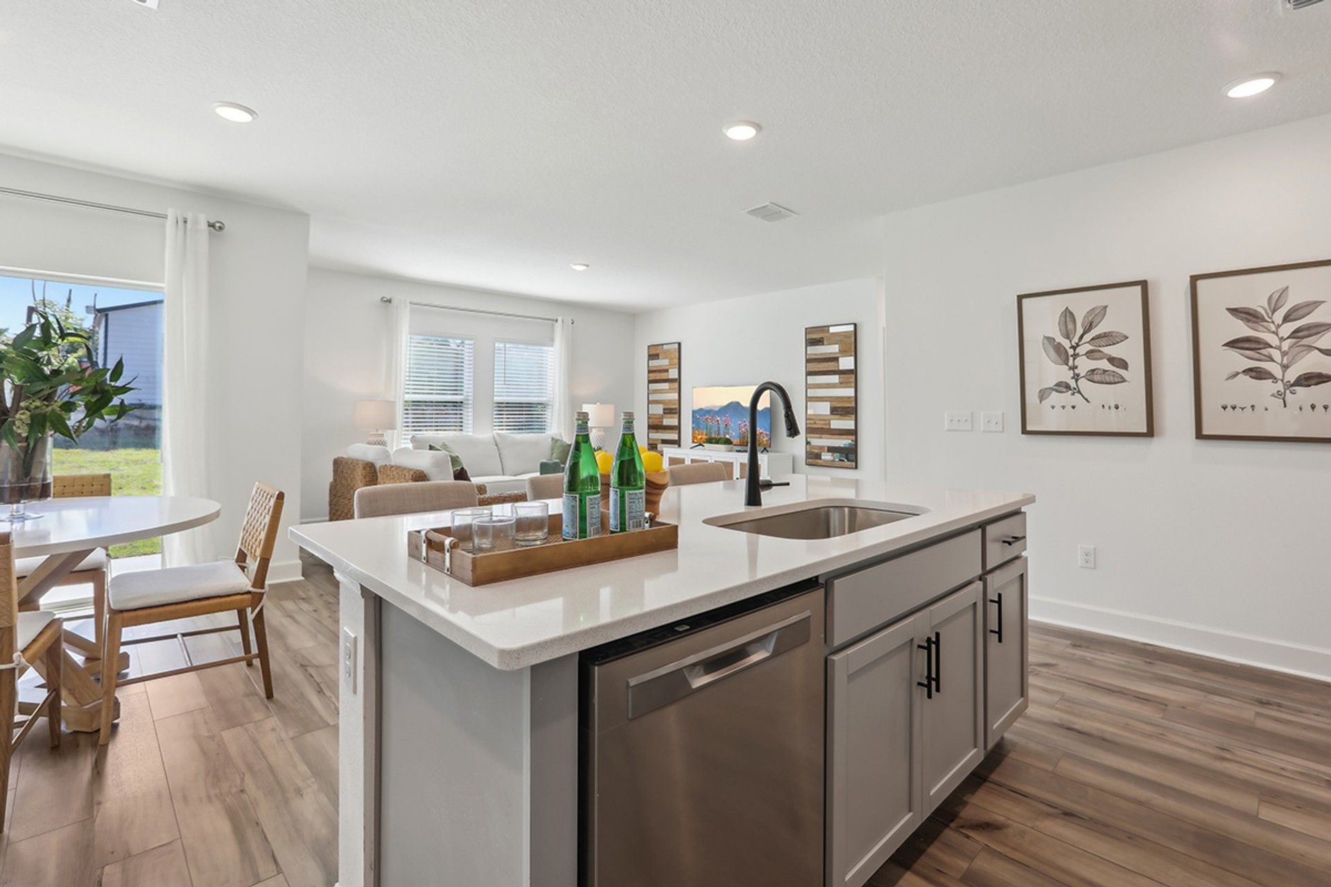 Sleek open-concept kitchen with an elegant island in Spring Hill offers modern living at its finest.