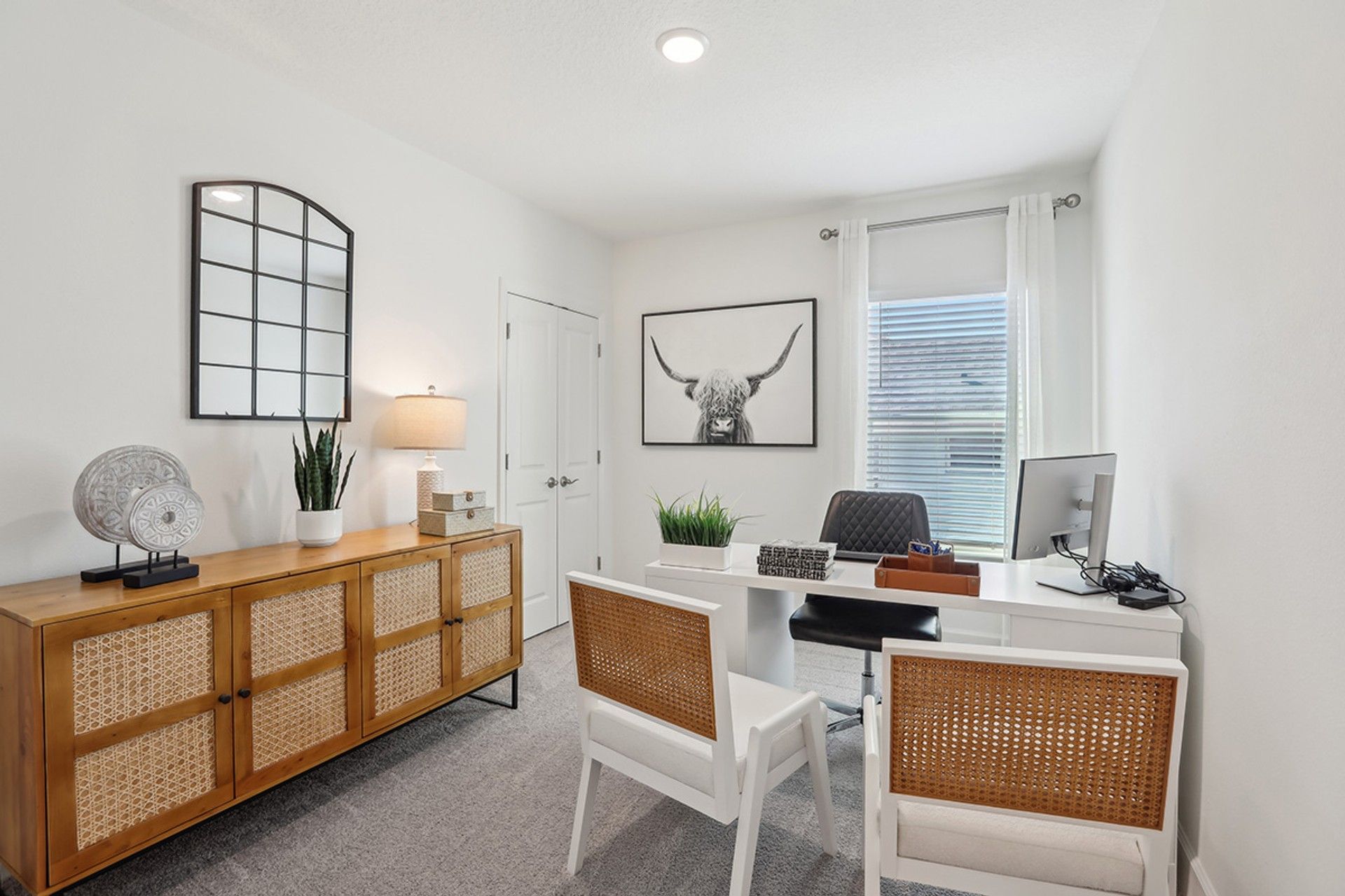 Elegant Spring Hill office with woven accents and sleek furniture, perfect for luxury and comfort.