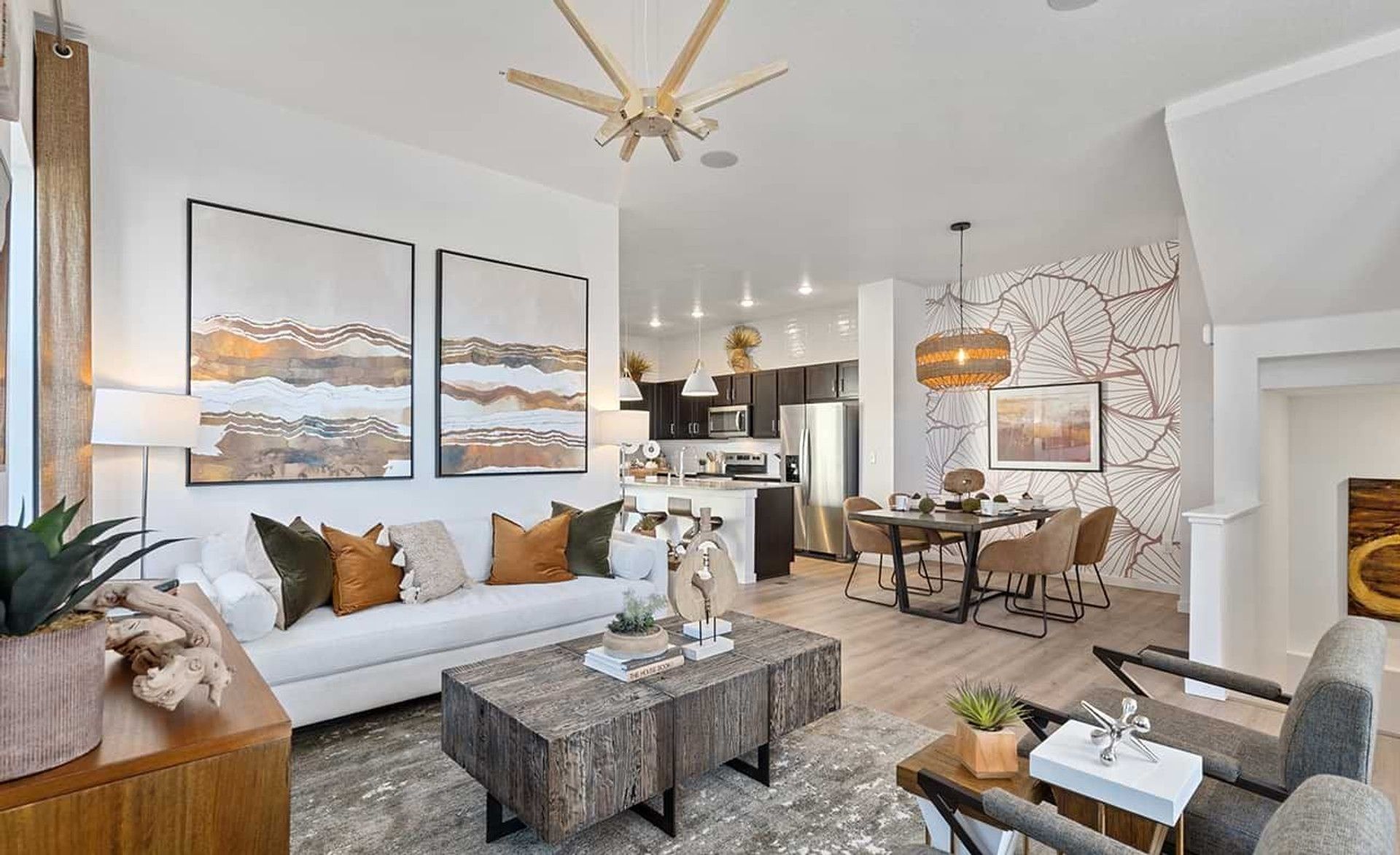 Luxurious wooden accents and modern abstract art create sophisticated charm in Trailside on Harmony.