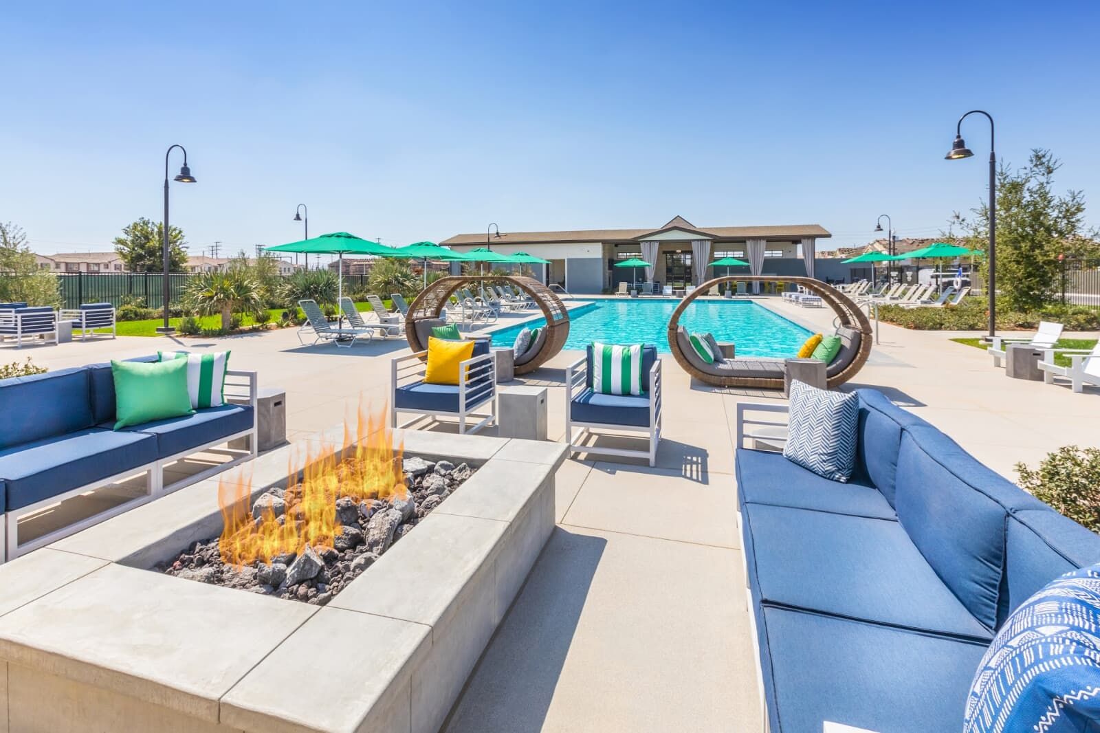 Emerald Park fire pit, pool, and covered cabana at New Haven.