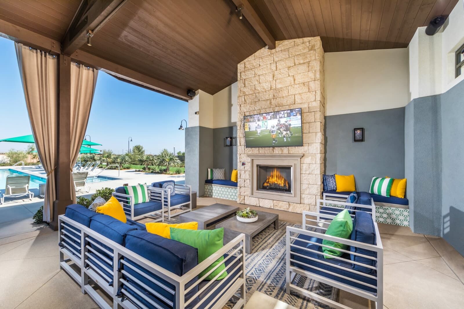 Emerald Park fire pit, pool, and covered cabana aCovered cabana with TV and fireplace at Emerald Park.t New Haven.
