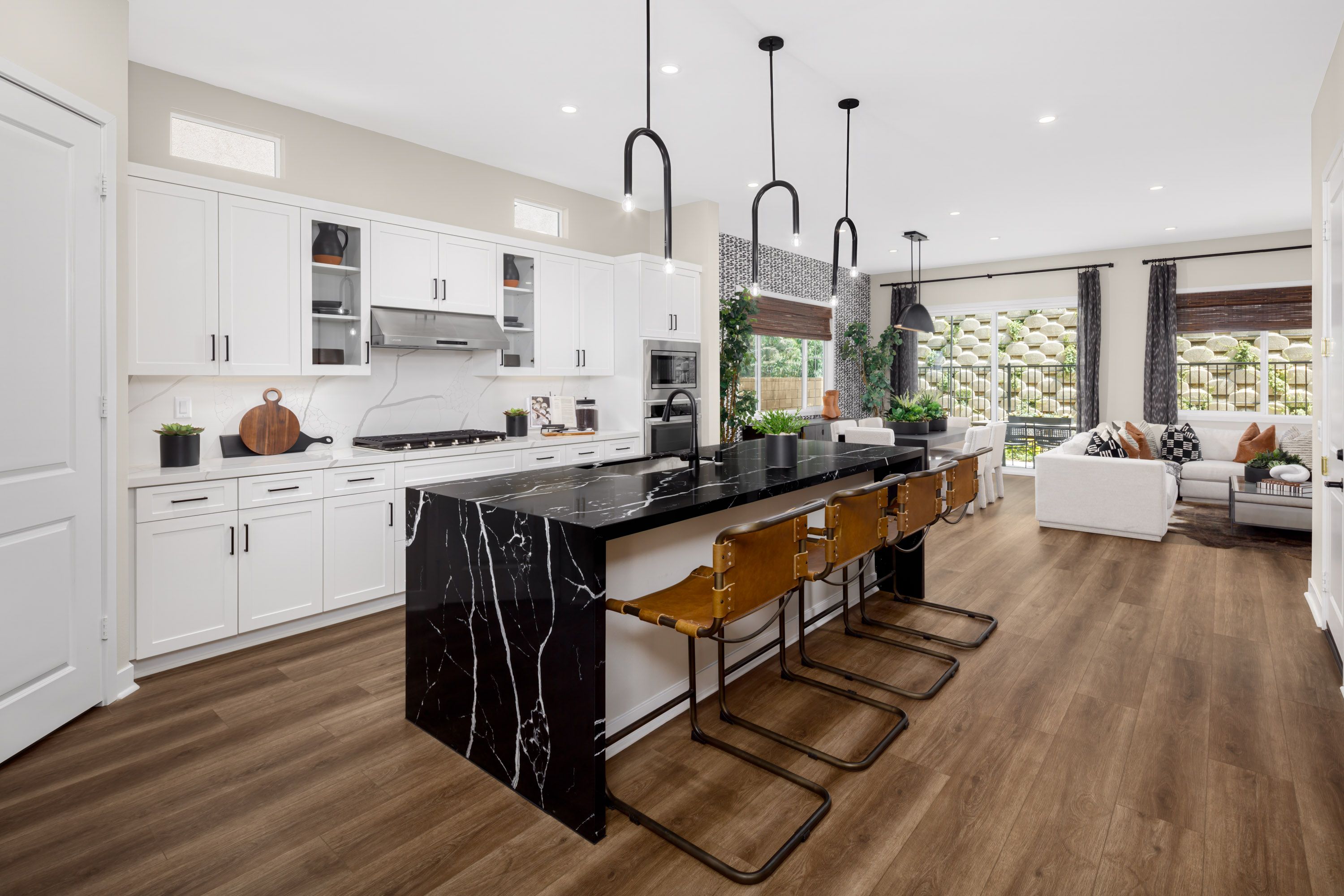 Black marble waterfall kitchen island