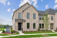 Painted Tree - Woodland District por CB JENI Homes en Dallas Texas