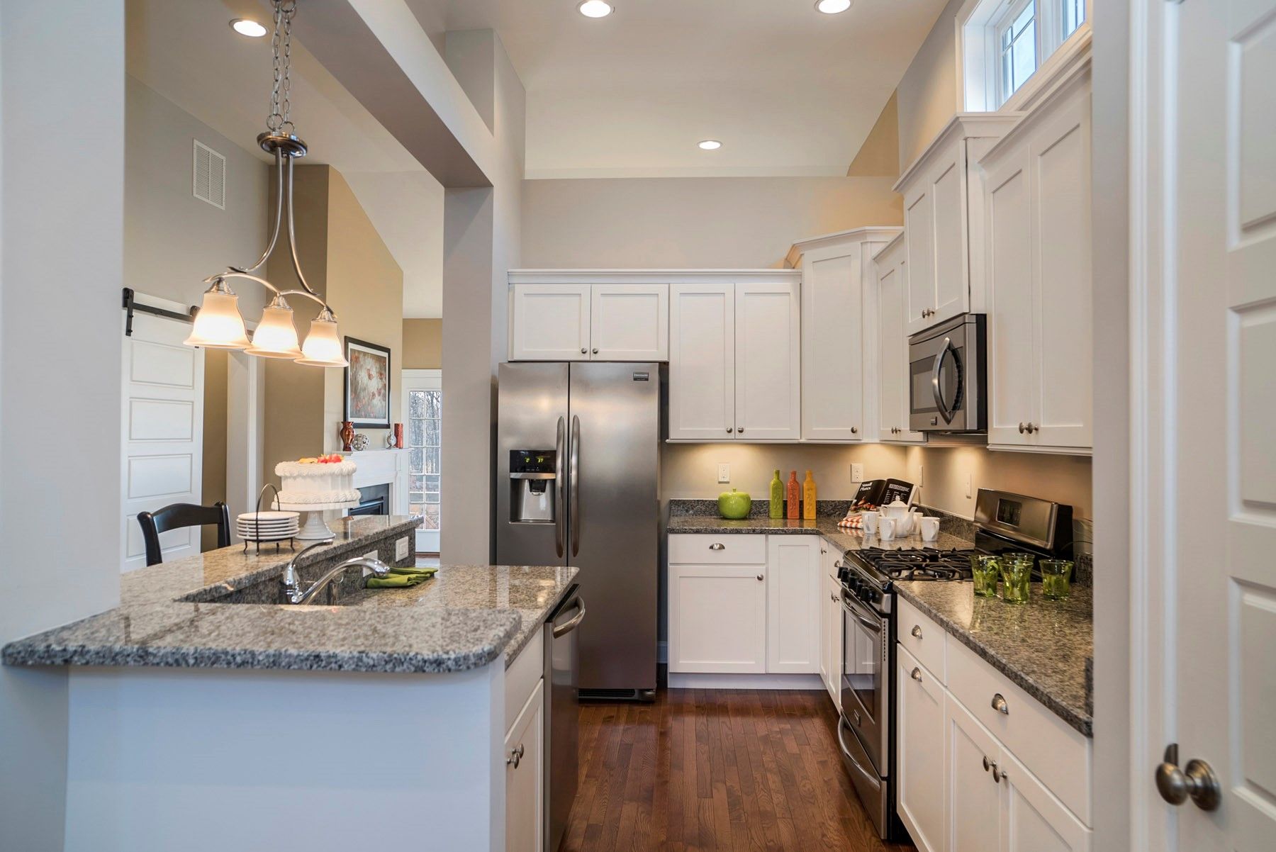 Kitchen with granite counter tops and island