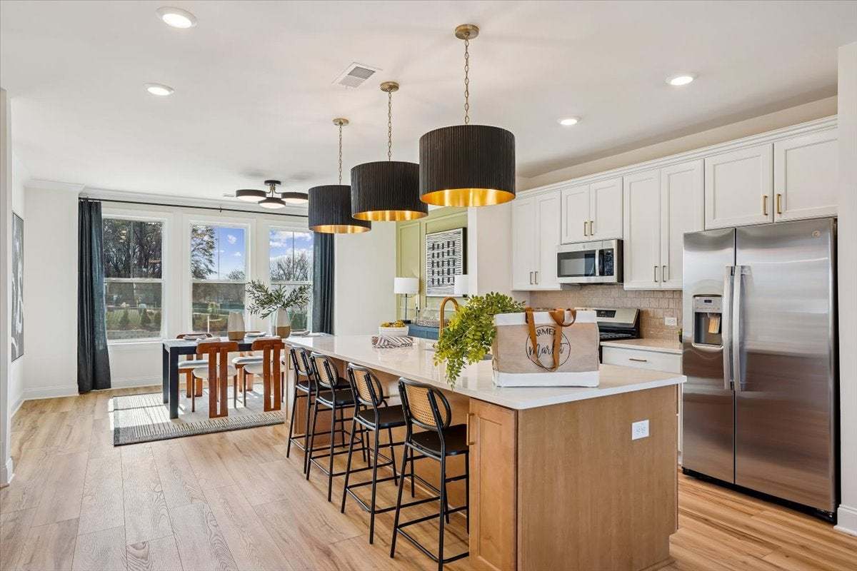 casa en Midtown Rows por Caruso Homes