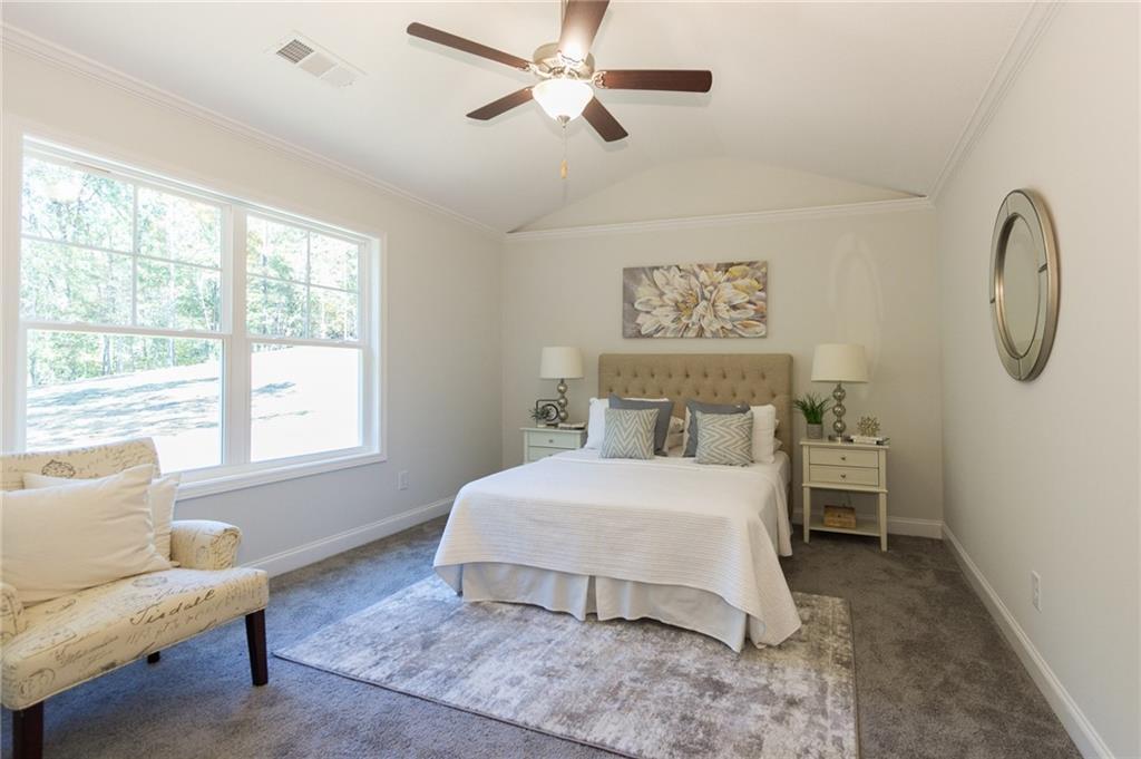 Master Bedroom with Vaulted Textured California Ceiling.  Upgraded 6 lb carpet pad.  Upgraded Trim Package