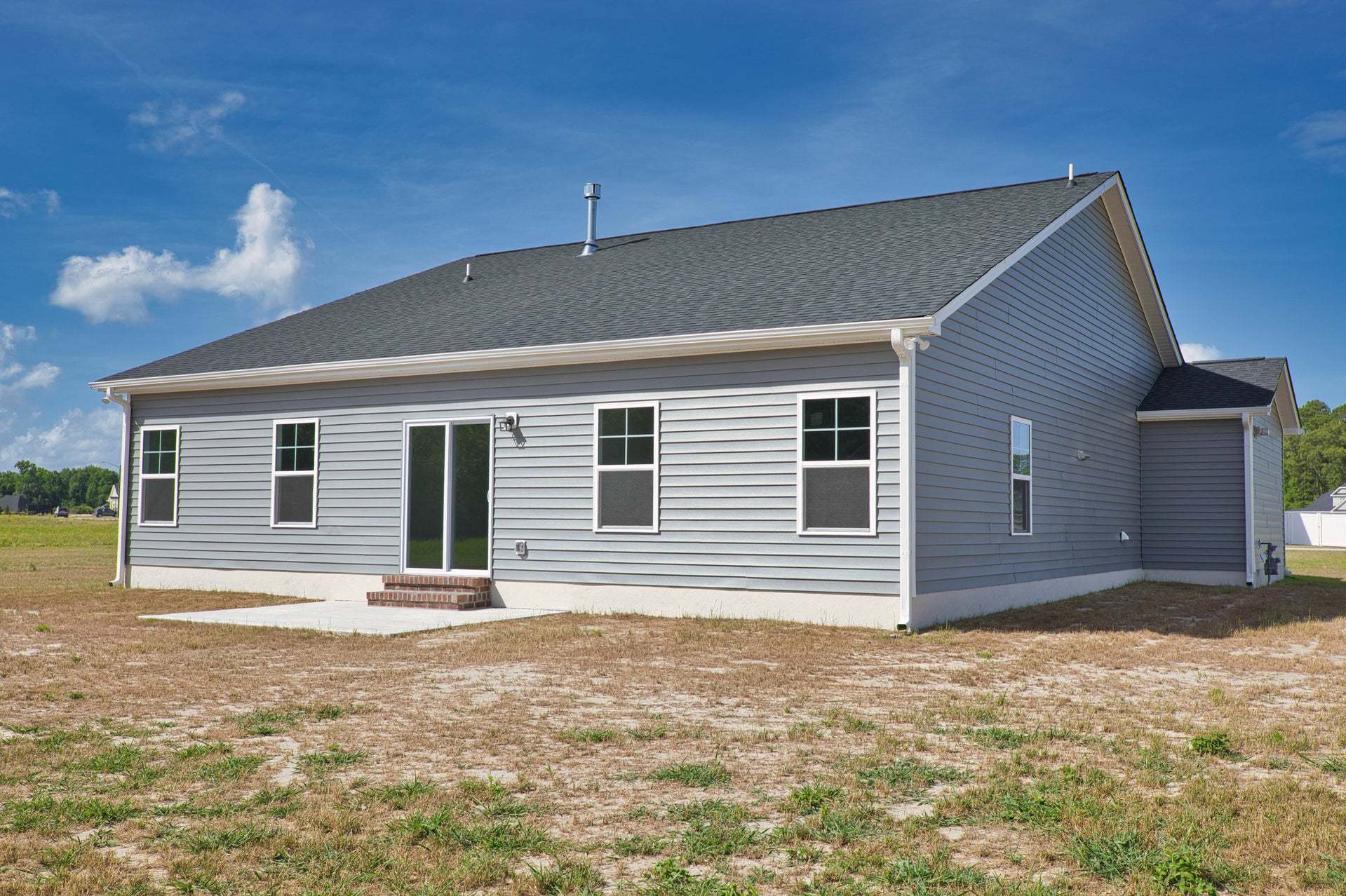 Back Patio with Carolina Room and Work Area Option
