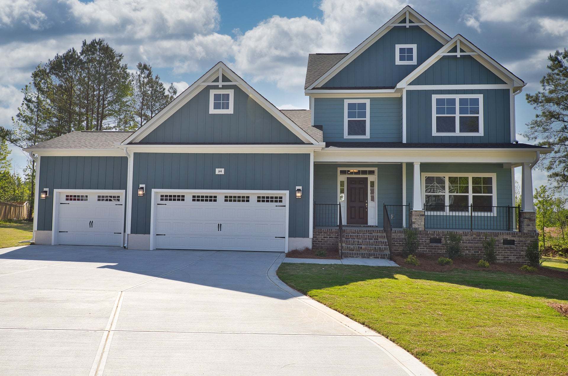 Elevation F with 3-Car garage