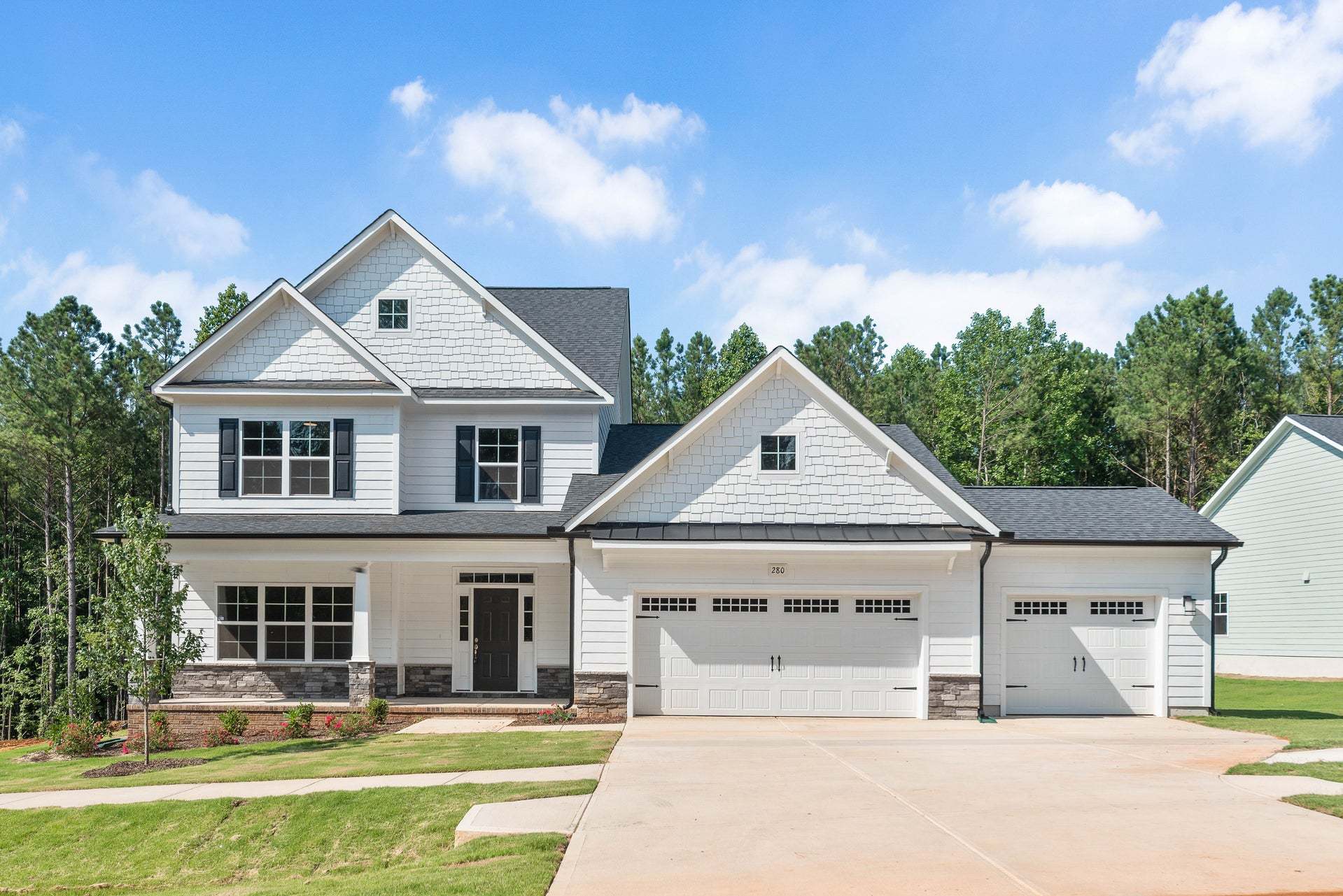 Elevation TW with 3-Car Garage