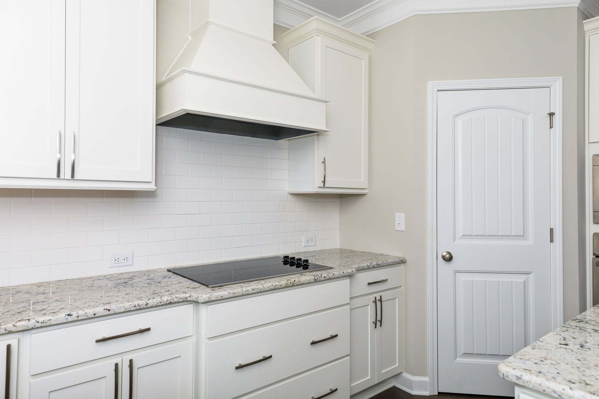 Gourmet kitchen layout with vent hood option.