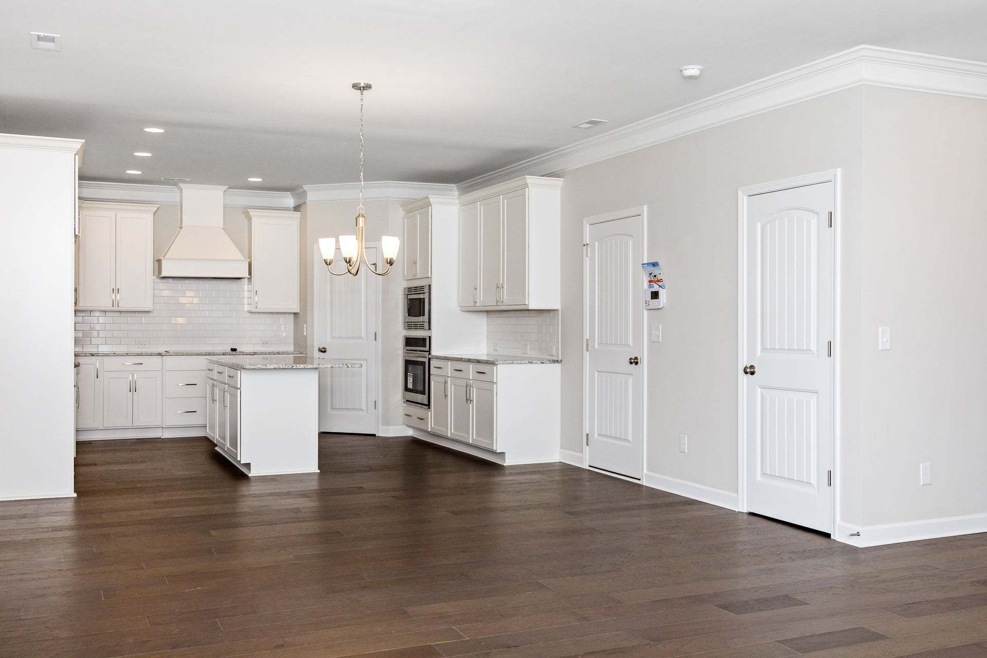 Gourmet kitchen layout with vent hood option.