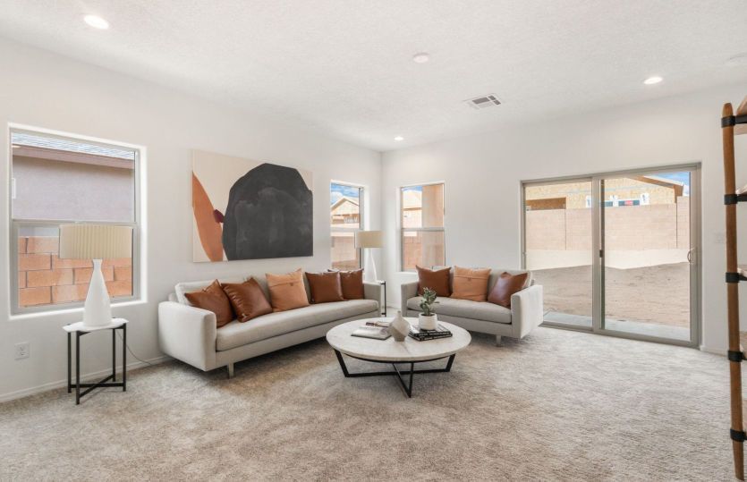 Gathering room is light and bright with overhead recessed lighting and windows