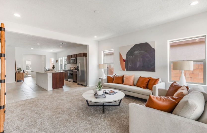 Roomy gathering area offering plenty of space for a full size couch, loveseat, and more