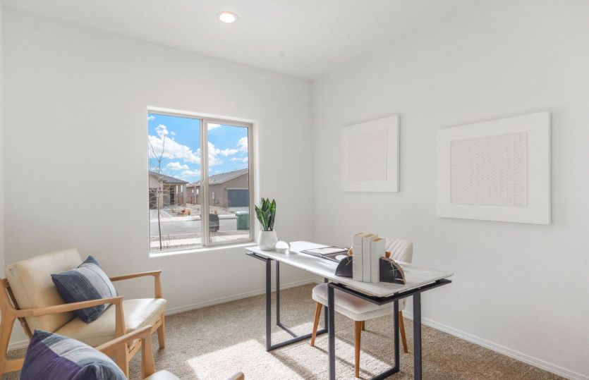 Secondary bedroom demonstrated as a home office space