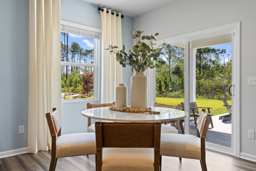 Dining Area. Model Home Representation.